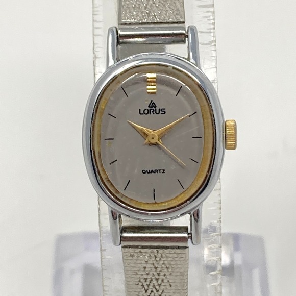 Lorus Accessories - Vintage Lorus Watch Women 16mm Silver Tone V811-5070 Adjustable New Battery 7"